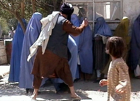 Taliban beating woman in public RAWA